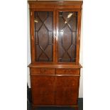 A maple veneered bookcase, W. 92cm H. 193cm.