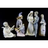 Four Lladro porcelain figures, tallest H. 19cm.