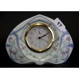 A Lladro porcelain clock, H. 14cm.