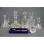 A Webb crystal ships decanter, Edinburgh crystal magnifying glass and five further pieces of