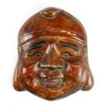An interesting Chinese carved and hand painted early 20th Century happy Buddha mask, W. 21cm.