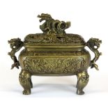 A Chinese bronze dragon censer, W. 15cm H. 12cm.