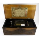 A Victorian music box playing eight tunes, in full w/o, 37 x 19 x 12cm.