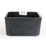 An unusual Egyptian black glass bowl, 15.5 x 8cm.