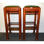A pair of leather topped vintage bar stools, H. 77cm.