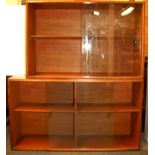 A pair of 1970's glazed teak wall mounted bookcases, size 92 x 60cm.