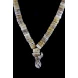A rare strand of Tibetan human skull prayer beads, folded L. 28cm bead Dia. 1cm.