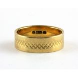 An 18ct yellow gold (stamped 18ct) wedding band, W. 5.1g (O).