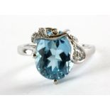 A 925 silver ring set with an oval cut Swiss blue topaz, 1.4 x 0.8cm, (N.5).