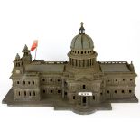 A hand made wooden model of St Pauls Cathedral, L. 42cm H. 25cm.