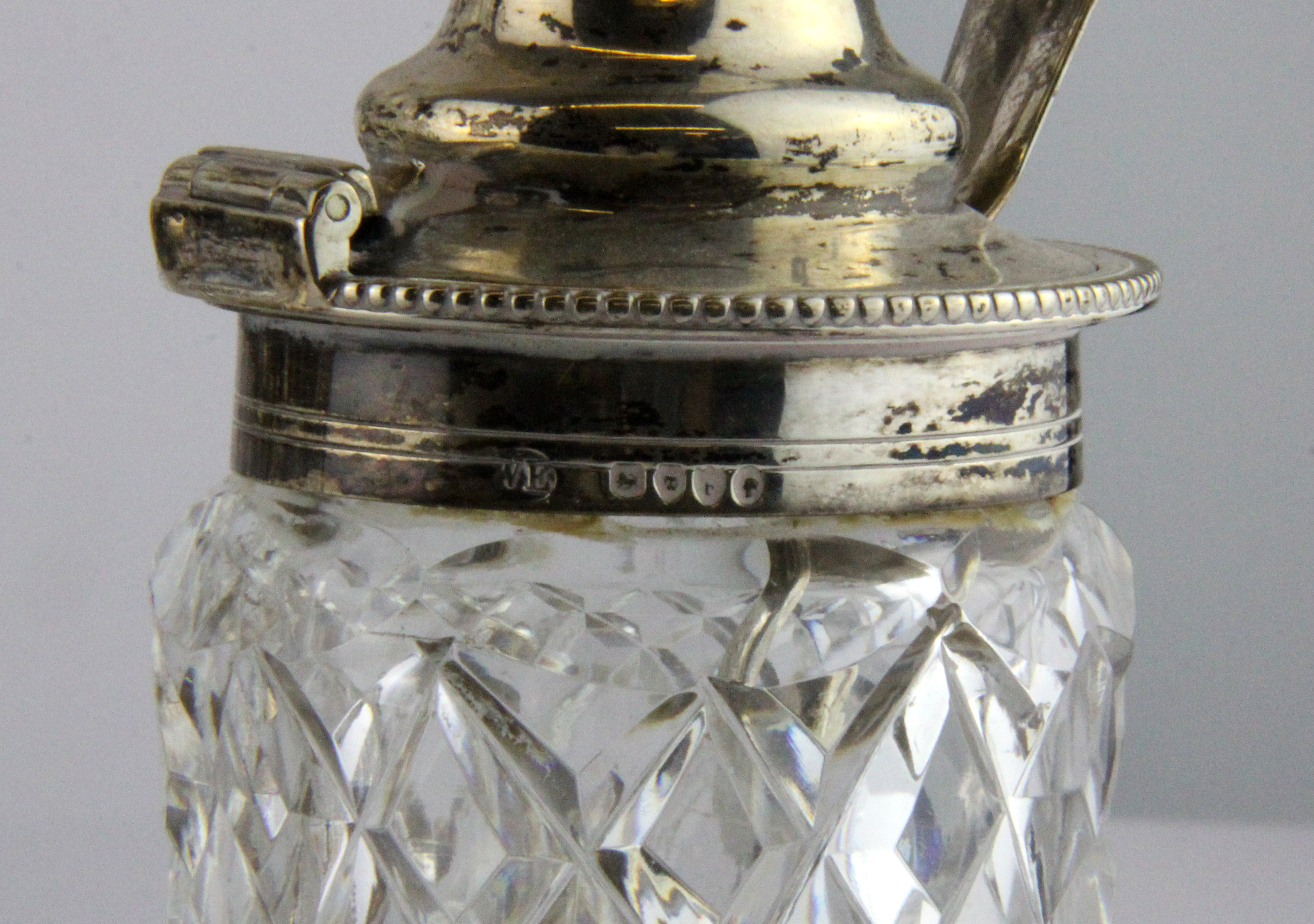 A superb hallmarked silver and cut glass seven bottle Victorian cruet set, W. 27cm H. 28cm. (In - Image 2 of 5