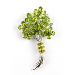 A 925 silver brooch set with oval cut peridots, emeralds and chrome diopsides, 6.5 x 4cm.