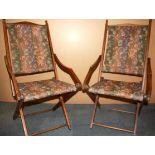 A pair of Edwardian steamer chairs.