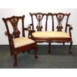 A dolls carved wooden settee and armchair, H. 50cm.