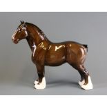 A large porcelain Beswick shire horse with pink ribbon, H. 27cm.