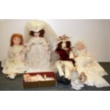 A group of porcelain dolls.