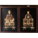 A pair of Chinese framed hand painted relief decorated panels, 36 x 45cm.