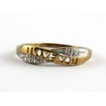 A 9ct yellow gold diamond set ring with I LOVE YOU pierced, (L.5).
