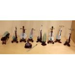 A collection of Chinese miniature musical instruments made with semi-precious stones.