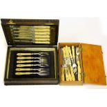 A set of twelve silverplate and ivory handled fruit knives and forks by Paul Storr with additional