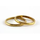 Two 22ct yellow gold wedding bands, W. 5.4g (O & Q).
