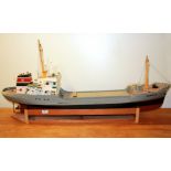 A large motorised wooden model ship, L. 120cm.