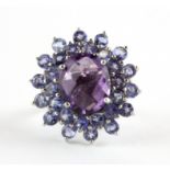 A 925 silver large cluster ring set with a checker board cut amethyst and tanzanites, 2 x 2.5cm, (