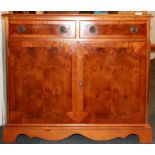 A maple veneered cabinet, W. 92cm H. 80cm.