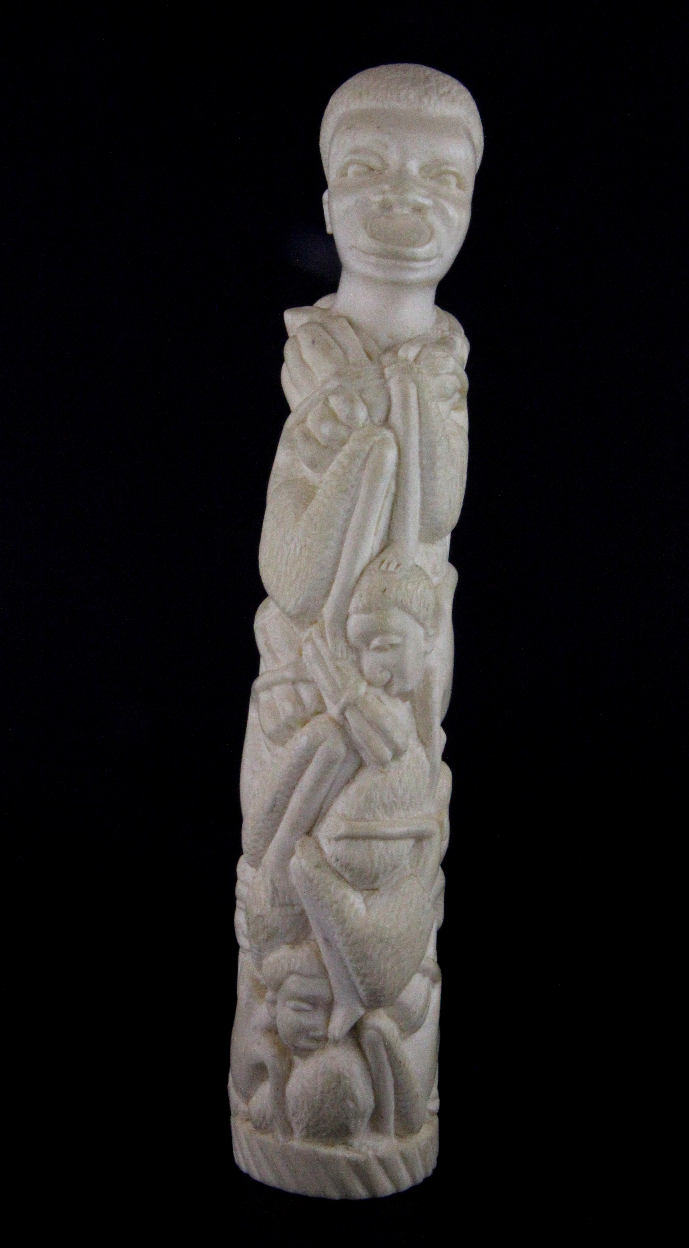 An early 20th Century African carved ivory tribal figure, H. 25cm.