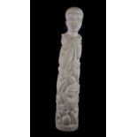 An early 20th Century African carved ivory tribal figure, H. 25cm.