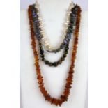 Four mixed amber, tiger eye and pearl necklaces.