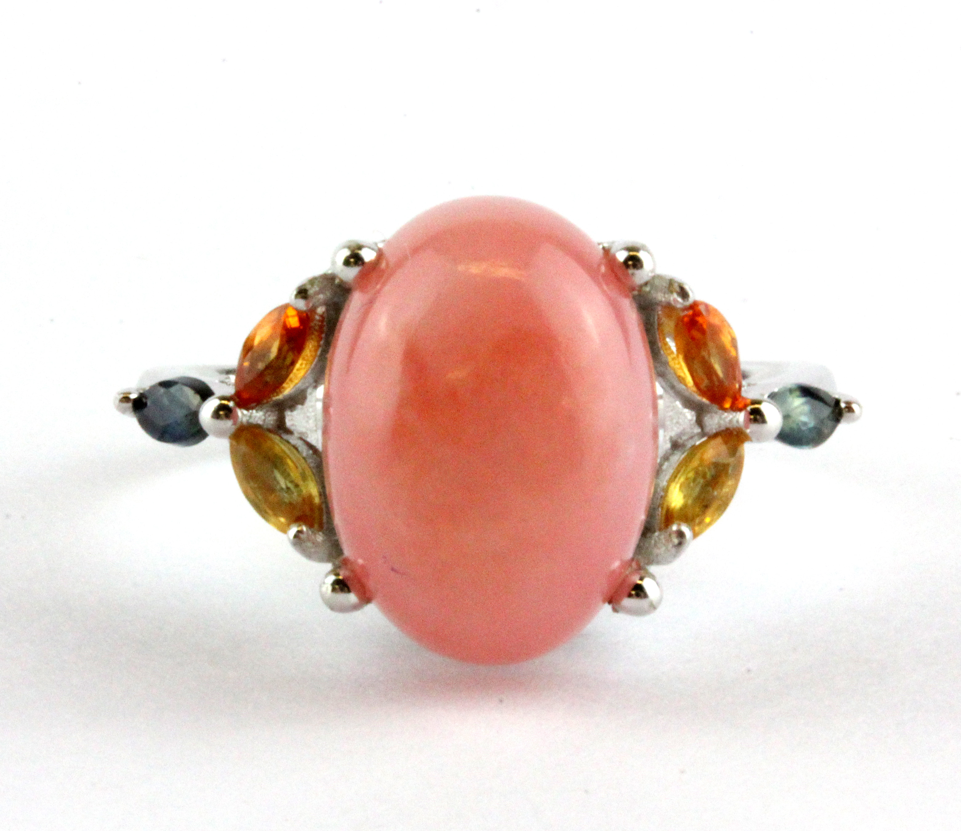 A 925 silver ring set with a cabochon cut pink opal and marquise cut fancy coloured sapphires, (P.