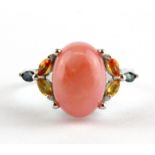 A 925 silver ring set with a cabochon cut pink opal and marquise cut fancy coloured sapphires, (P.