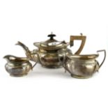 A three piece hallmarked silver tea set ( Approx 547 grams ).