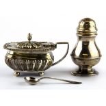 A hallmarked silver mustard pot and pepperette.