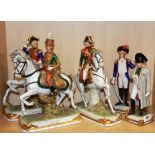 A German porcelain figure of Napoleon, H. 23cm together with four further porcelain figures of