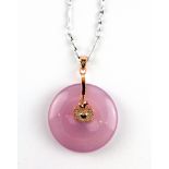 A rose metal mounted lavender jade pi disk pendant on a white metal chain, Dia. 3cm.
