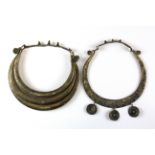 Two Chinese white metal minority tribe neck decorations.
