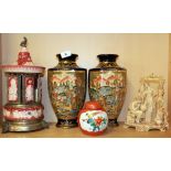A musical ceramic cigarette holder, a pair of Satsuma vases (one A/f) a porcelain group figure and a