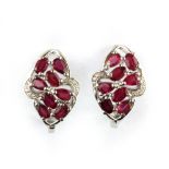 A pair of 925 silver earrings set with oval and pear cut rubies and cubic zirconia, L. 2cm.