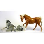 Two Beswick porcelain horse figures, tallest H. 18cm.