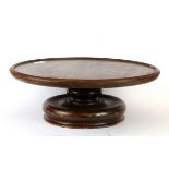 A wooden revolving lazy susan, Dia. 42cm.