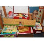 A wooden toy fort, vintage lego and other toys and games.
