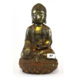 A Chinese gilt cast iron figure of the seated Buddha, H. 33cm.