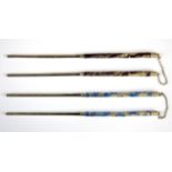 Two pairs of Chinese enamelled white metal (Chinese mark and tested silver) pairs of hair ornaments,
