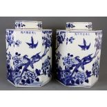 A pair of Chinese hand painted hexagonal porcelain jars and lids.