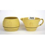 A Wedgwood creamware milk jug and sugar bowl, jug H. 6.5cm.