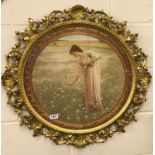 A very fine Florentine gilt carved wood picture frame containing an elegant lithograph, frame Dia.