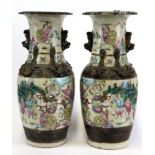 A pair of 19th Century Chinese hand painted porcelain vases, H. 26cm.
