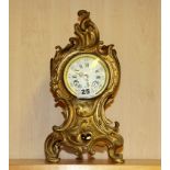 A 19th Century French gilt brass mantel clock, H. 31cm.